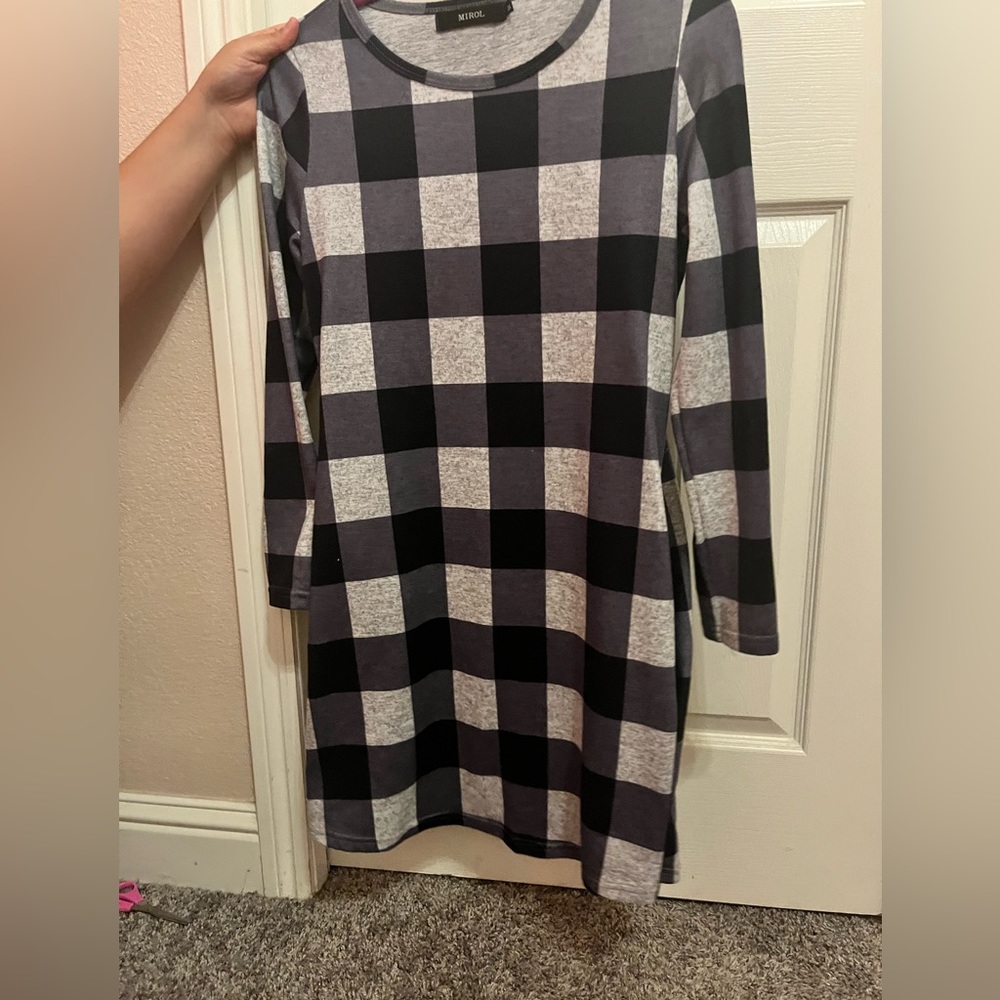 A cute shirt dress colored from grey black and silver